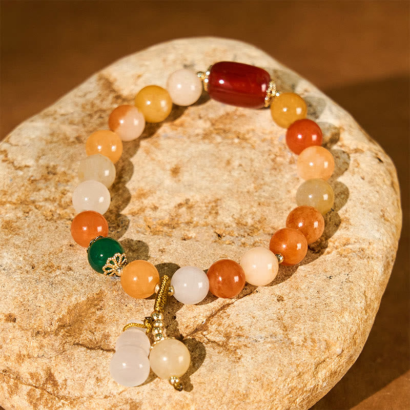 Bracelet en jade de soie dorée de 8 mm pour la richesse et la chance