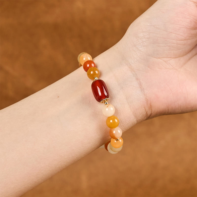 Bracelet en jade de soie dorée de 8 mm pour la richesse et la chance