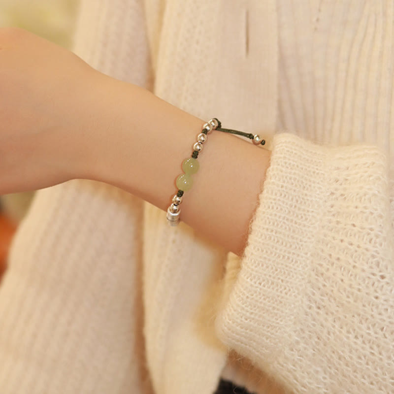 Bracelet d'abondance en jade Hetian de 8 mm avec personnage Fu