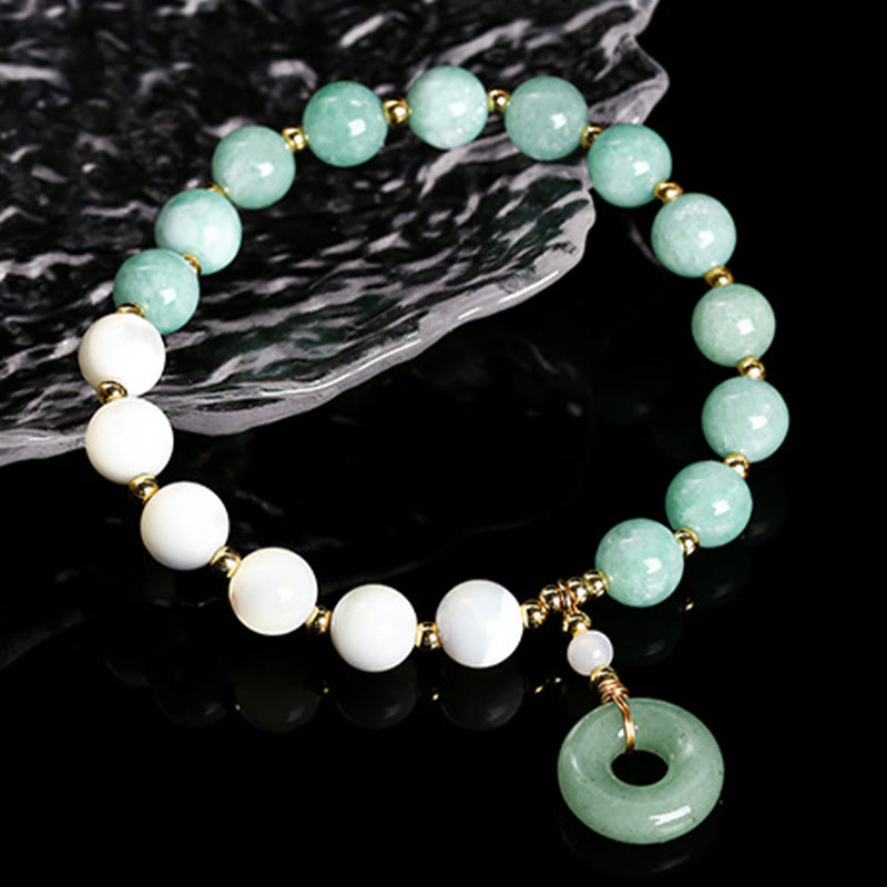 Bracelet d'abondance avec boucle de paix en jade trochus et escargot de 8 mm