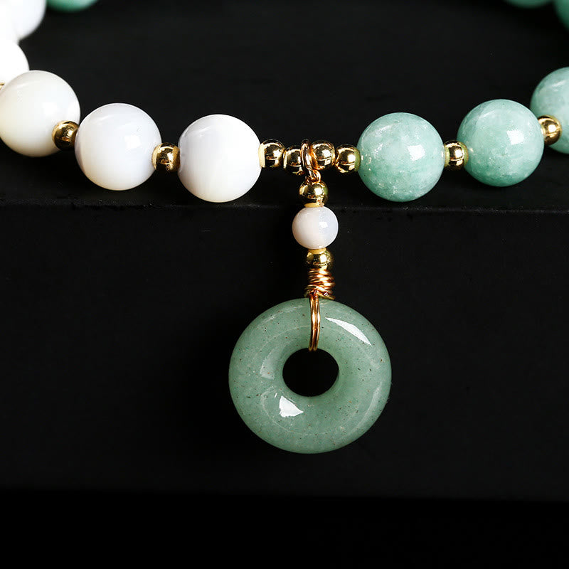 Bracelet d'abondance avec boucle de paix en jade trochus et escargot de 8 mm