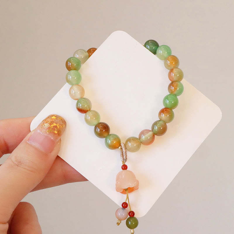 Bracelet boucle de paix en agate paon et papillon de 8 mm