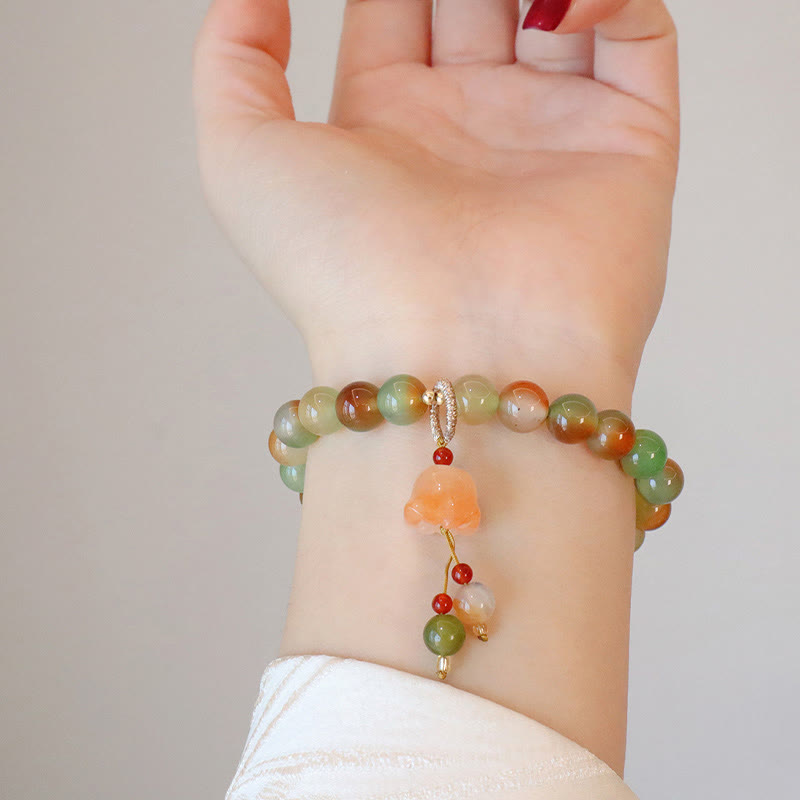 Bracelet boucle de paix en agate paon et papillon de 8 mm