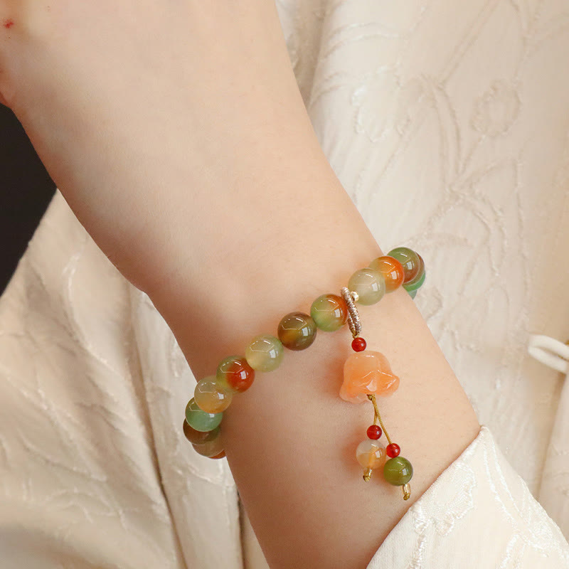 Bracelet boucle de paix en agate paon et papillon de 8 mm