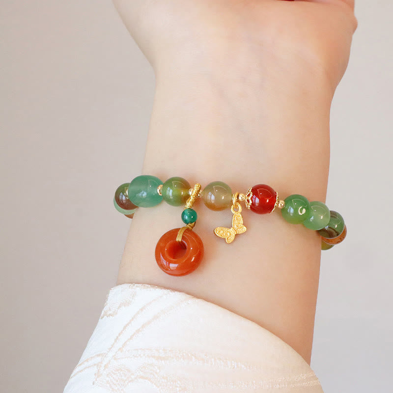 Bracelet boucle de paix en agate paon et papillon de 8 mm