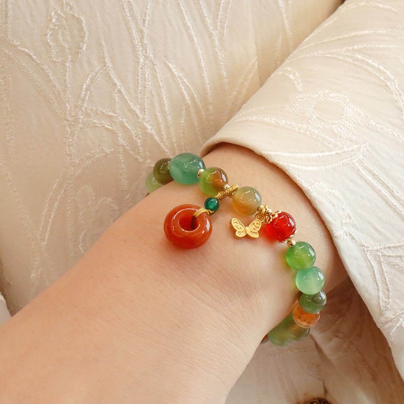 Bracelet boucle de paix en agate paon et papillon de 8 mm