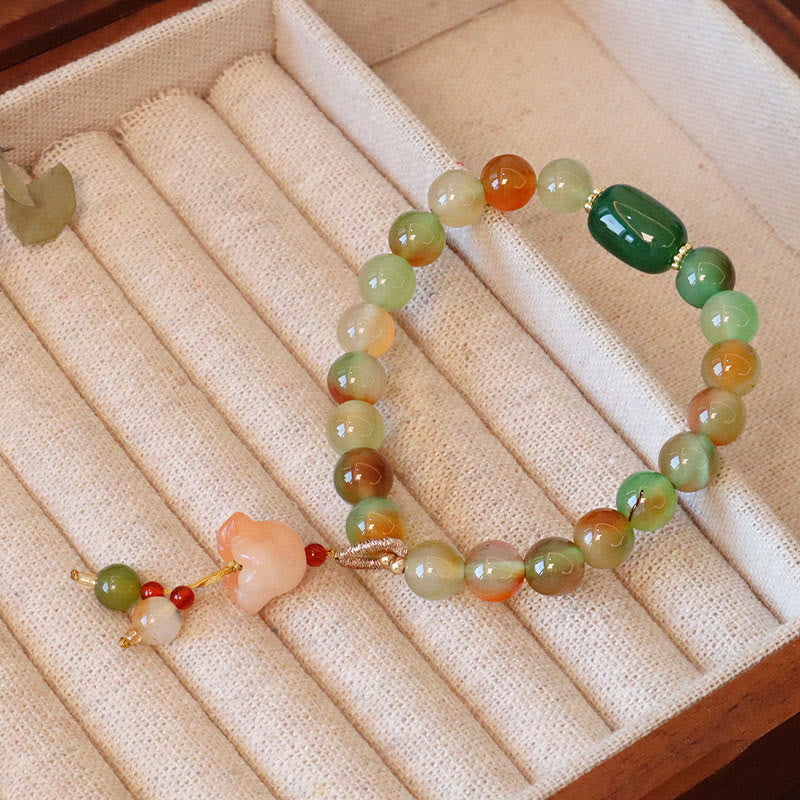 Bracelet boucle de paix en agate paon et papillon de 8 mm