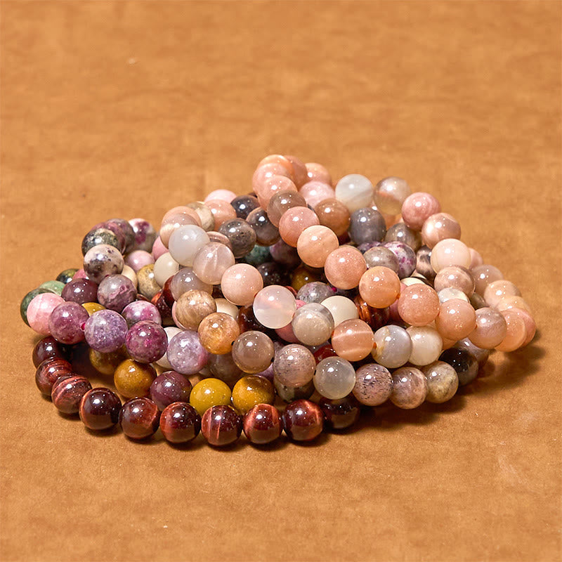 Bracelet œil de tigre rouge 8 mm pour la créativité et le courage