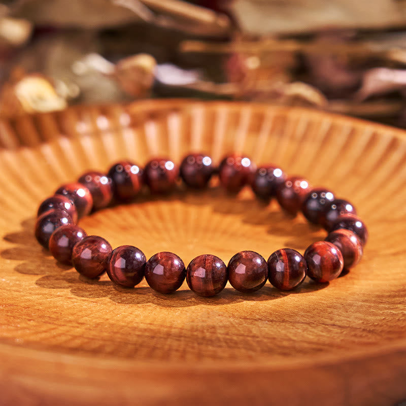 Bracelet œil de tigre rouge 8 mm pour la créativité et le courage