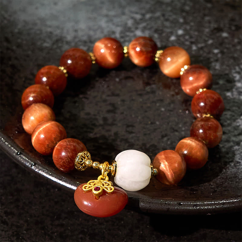 Bracelet œil de tigre rouge 8 mm pour la protection et l'équilibre