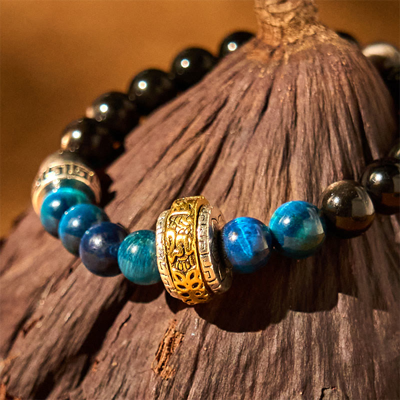Bracelet de protection en obsidienne argentée brillante de 8 mm avec œil de tigre bleu
