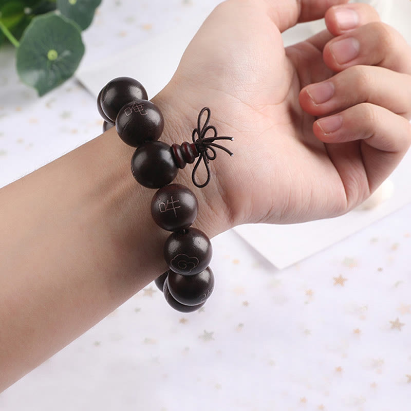 Bracelet Om Mani Padme Hum en bois de santal rouge à petites feuilles de 8 mm