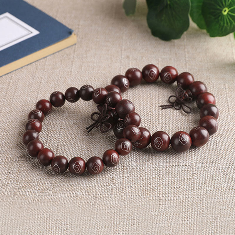 Bracelet Om Mani Padme Hum en bois de santal rouge à petites feuilles de 8 mm