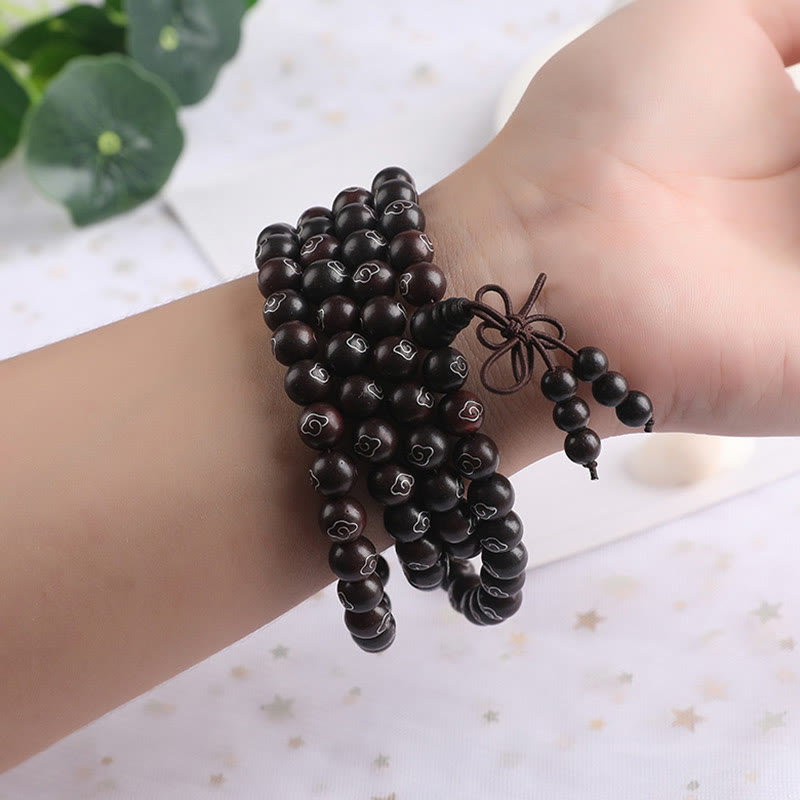 Bracelet Om Mani Padme Hum en bois de santal rouge à petites feuilles de 8 mm