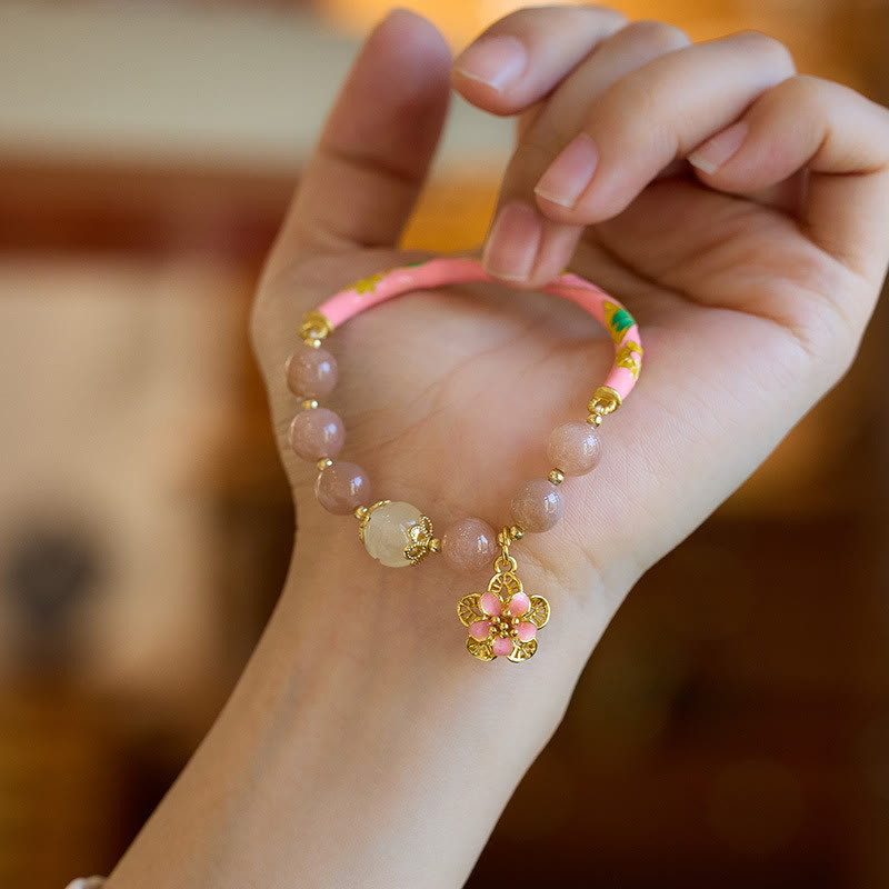 Bracelet de richesse en jade et soie dorée de 8 mm avec pierre de soleil