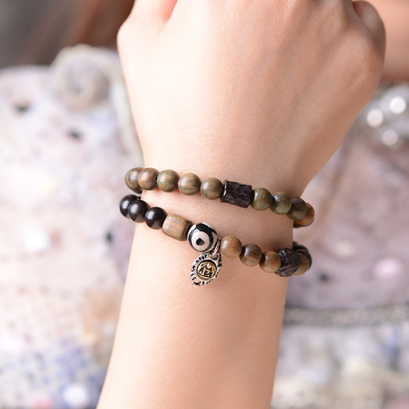 Bracelet spirituel tibétain en ébène et bois de santal vert de 8 mm