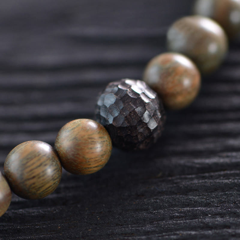 Bracelet spirituel tibétain en ébène et bois de santal vert de 8 mm