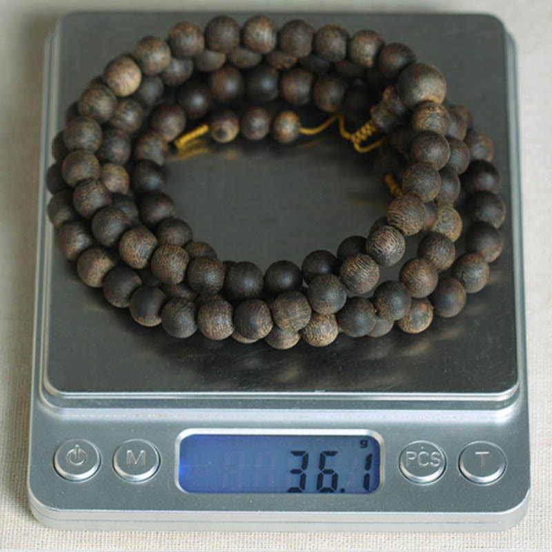 Bracelet Mala en bois d'agar Qinan blanc de 8 mm pour la paix et la force