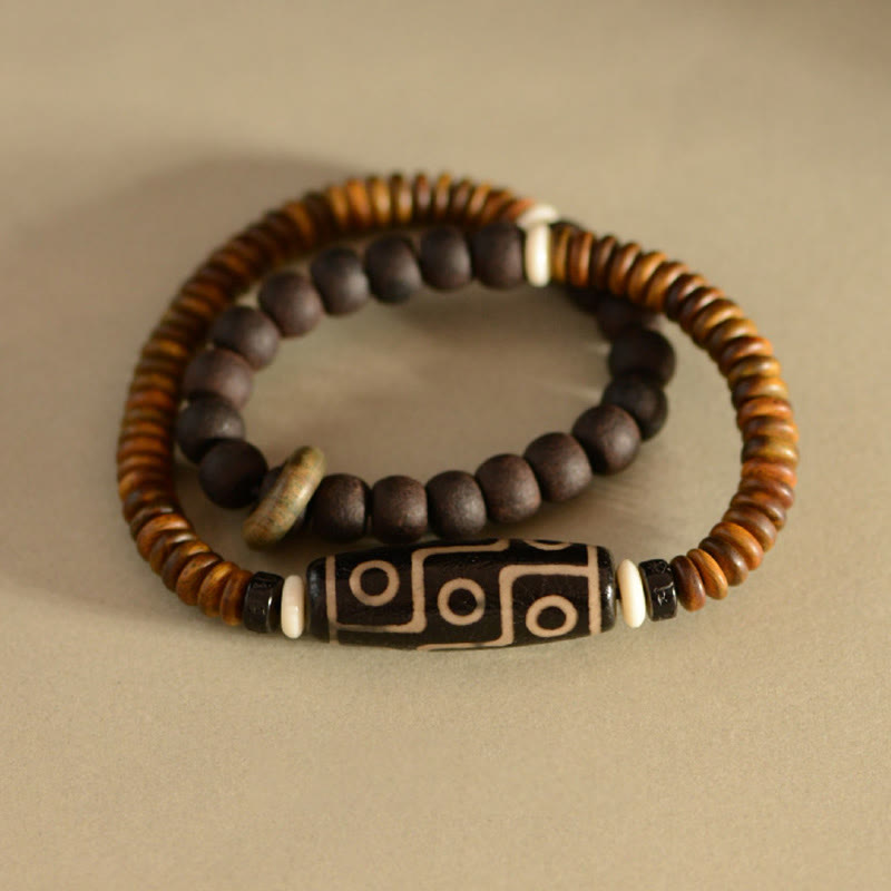 Bracelet spirituel double tour en bois d'ébène et perles Dzi à 9 œillets
