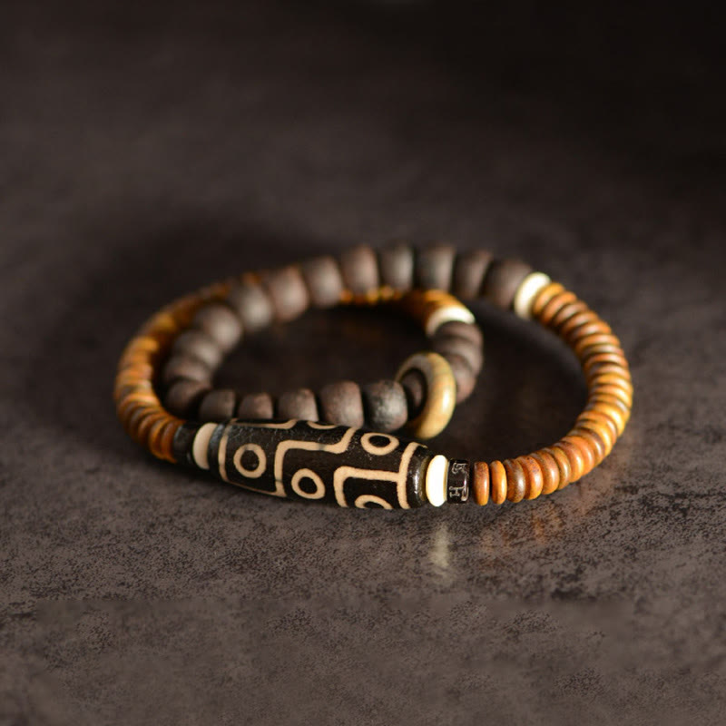 Bracelet spirituel double tour en bois d'ébène et perles Dzi à 9 œillets