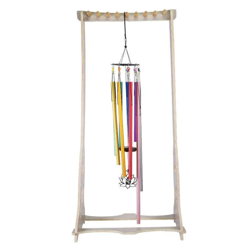 Colorful 9 Notes Chakra Equilibrium Swing Chimes hanging on a wooden stand