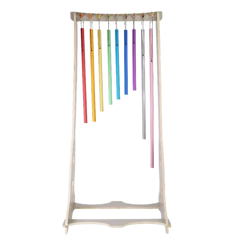 Rainbow-colored chimes hanging from wooden stand for 9 Notes Chakra Equilibrium Swing Chimes