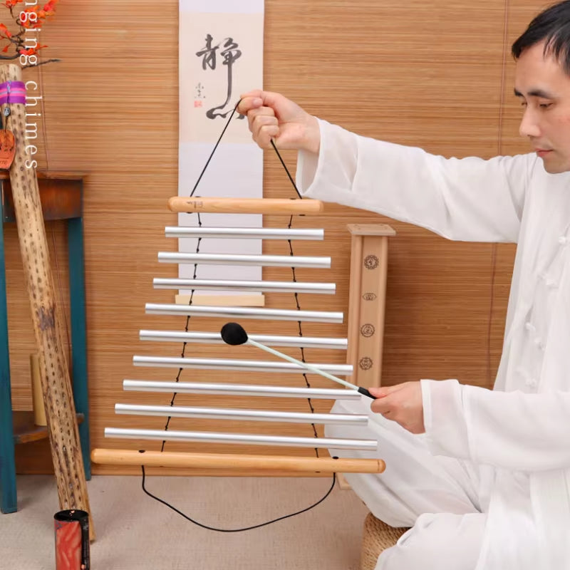 Wooden xylophone-style instrument with metal bars for Yoga sound therapy