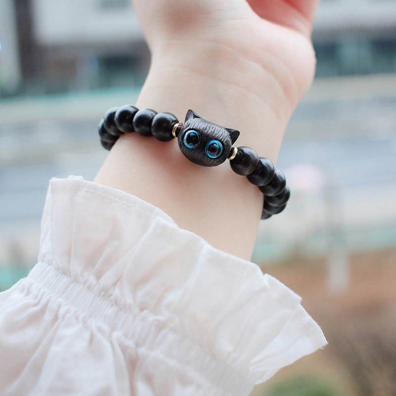 Bracelet de paix en bois d'ébène et bois de santal vert pour l'équilibre et le calme
