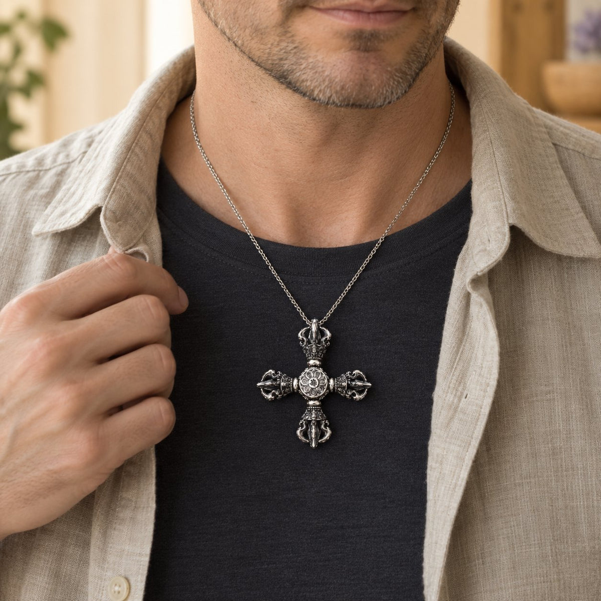Sterling Silver Double Dorje Vajra Pendant Spiritual Strength, worn on the neck by a man
