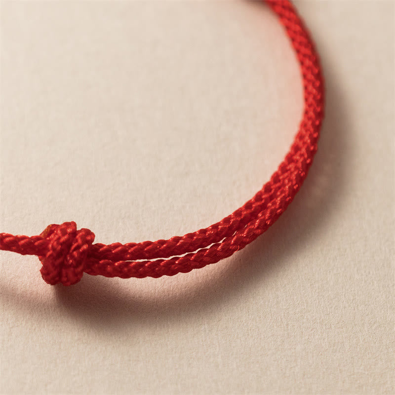 Bracelet en argent sterling 925 avec dragon sculpté et corde rouge