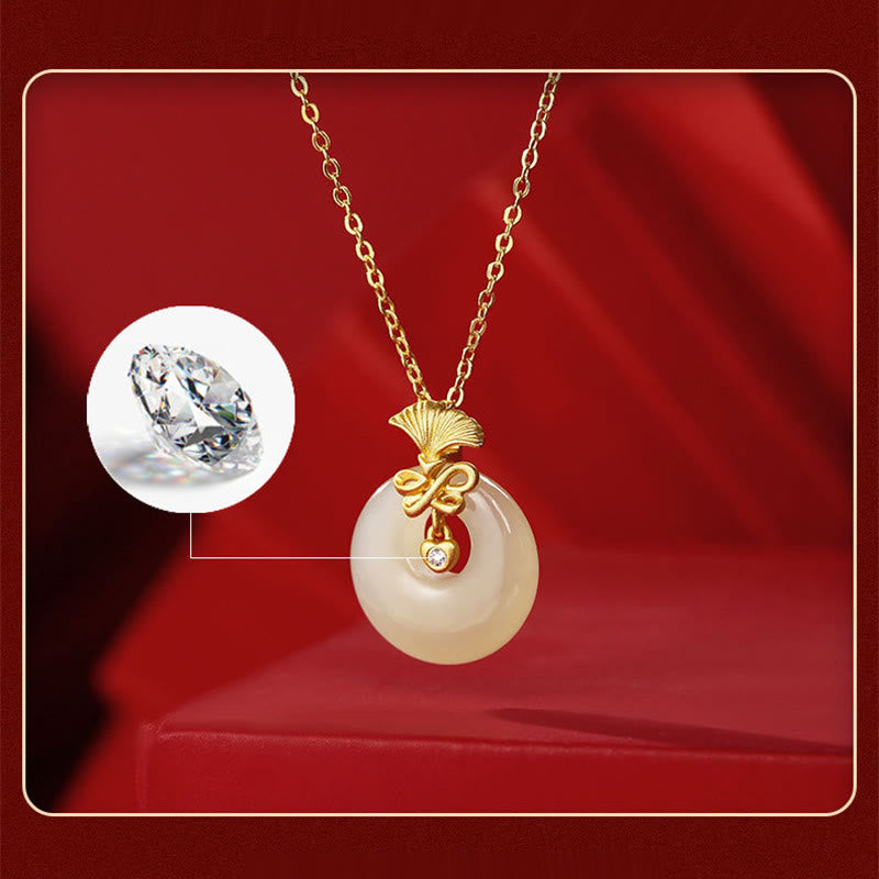 Collier en argent sterling 925 avec œillet en jade Hetian et fleur de prospérité