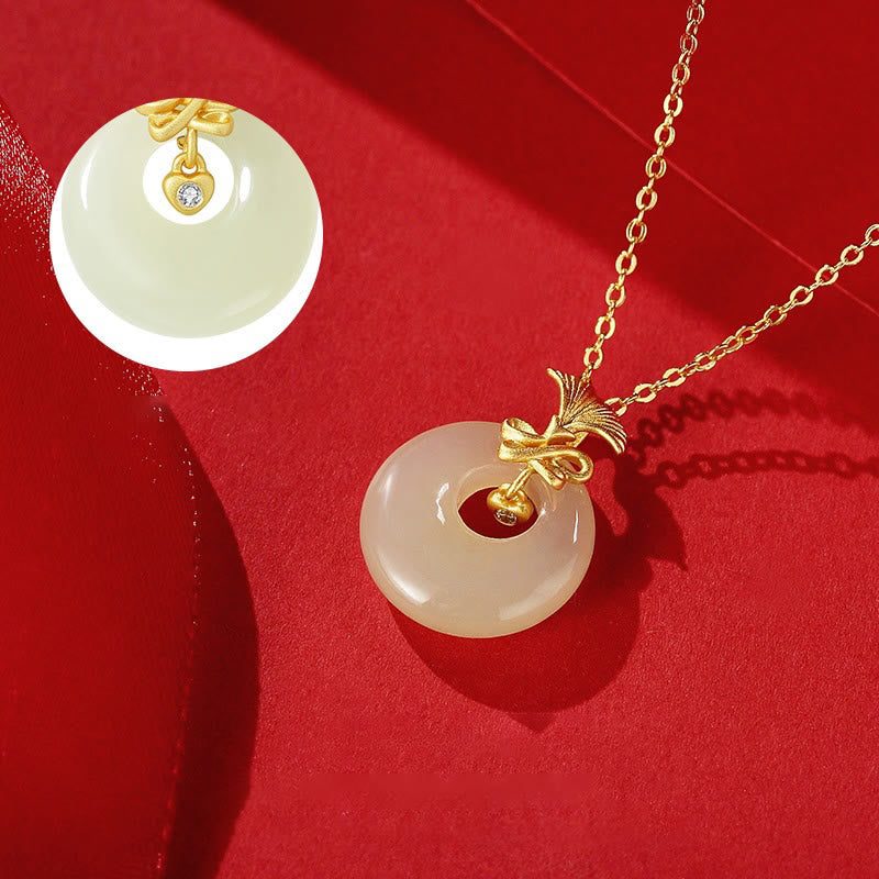 Collier en argent sterling 925 avec œillet en jade Hetian et fleur de prospérité