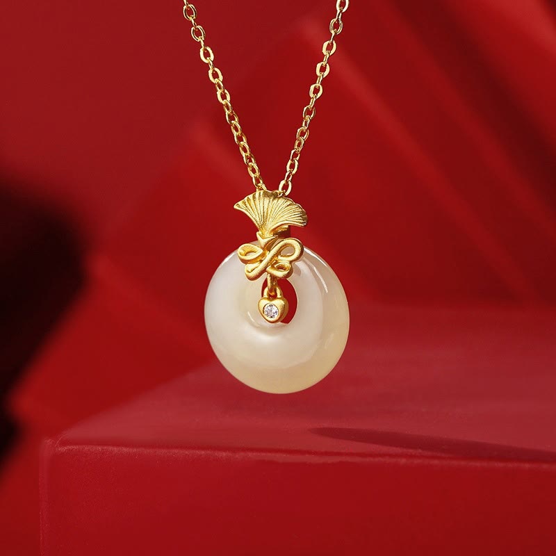 Collier en argent sterling 925 avec œillet en jade Hetian et fleur de prospérité