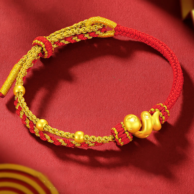 Bracelet porte-bonheur serpent en or 999 avec fil rouge