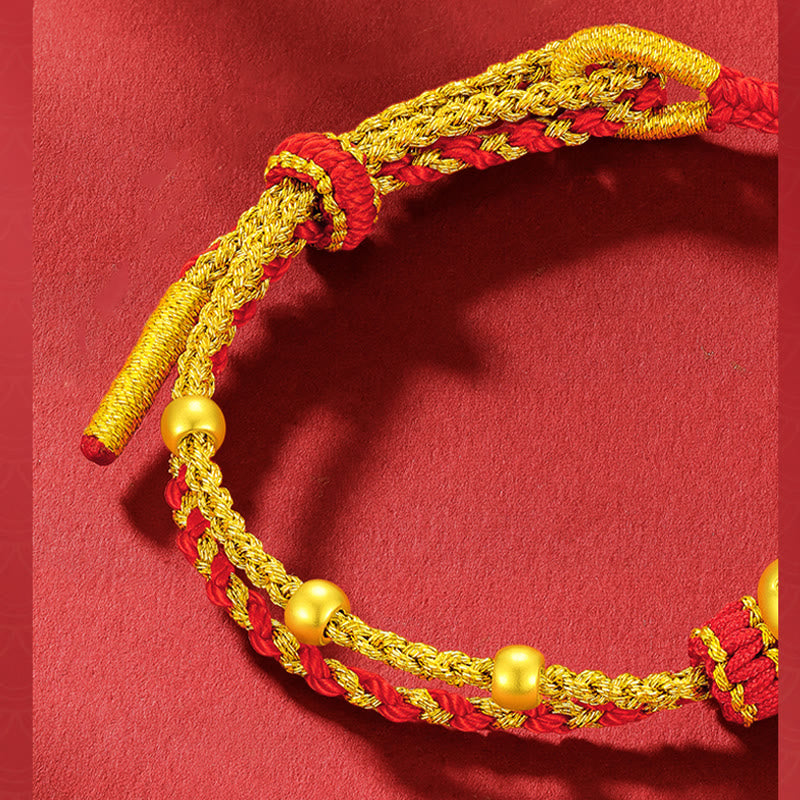 Bracelet porte-bonheur serpent en or 999 avec fil rouge