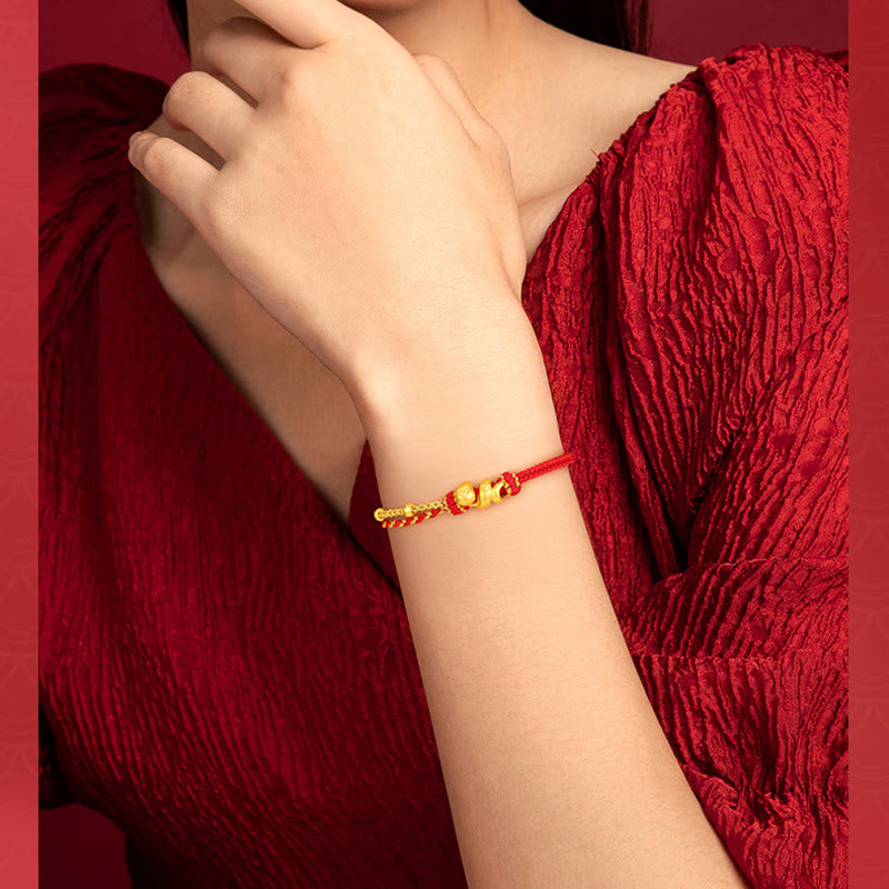 Bracelet porte-bonheur serpent en or 999 avec fil rouge
