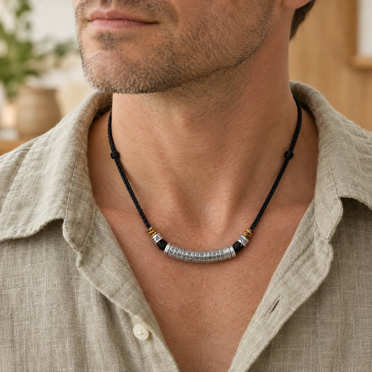 999 Sterling Silver Heart Sutra Necklace Pendant for Spiritual Wisdom, worn on the neck by a man