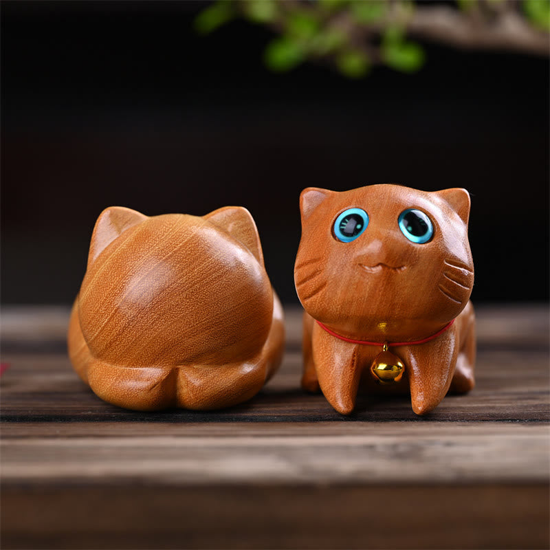 Sculpture décorative zen en bois de santal représentant un chat endormi de 9 cm