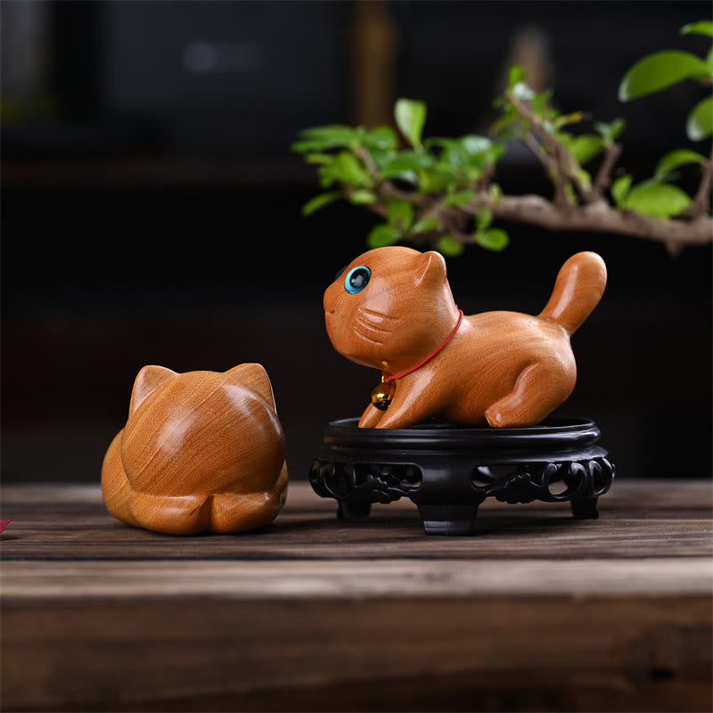 Sculpture décorative zen en bois de santal représentant un chat endormi de 9 cm