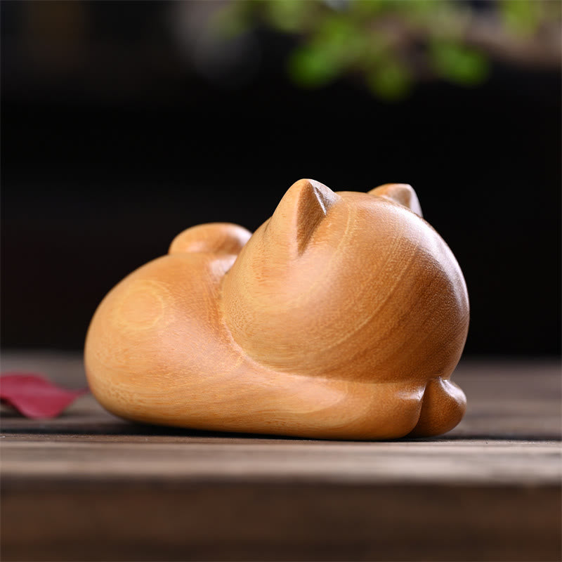 Sculpture décorative zen en bois de santal représentant un chat endormi de 9 cm