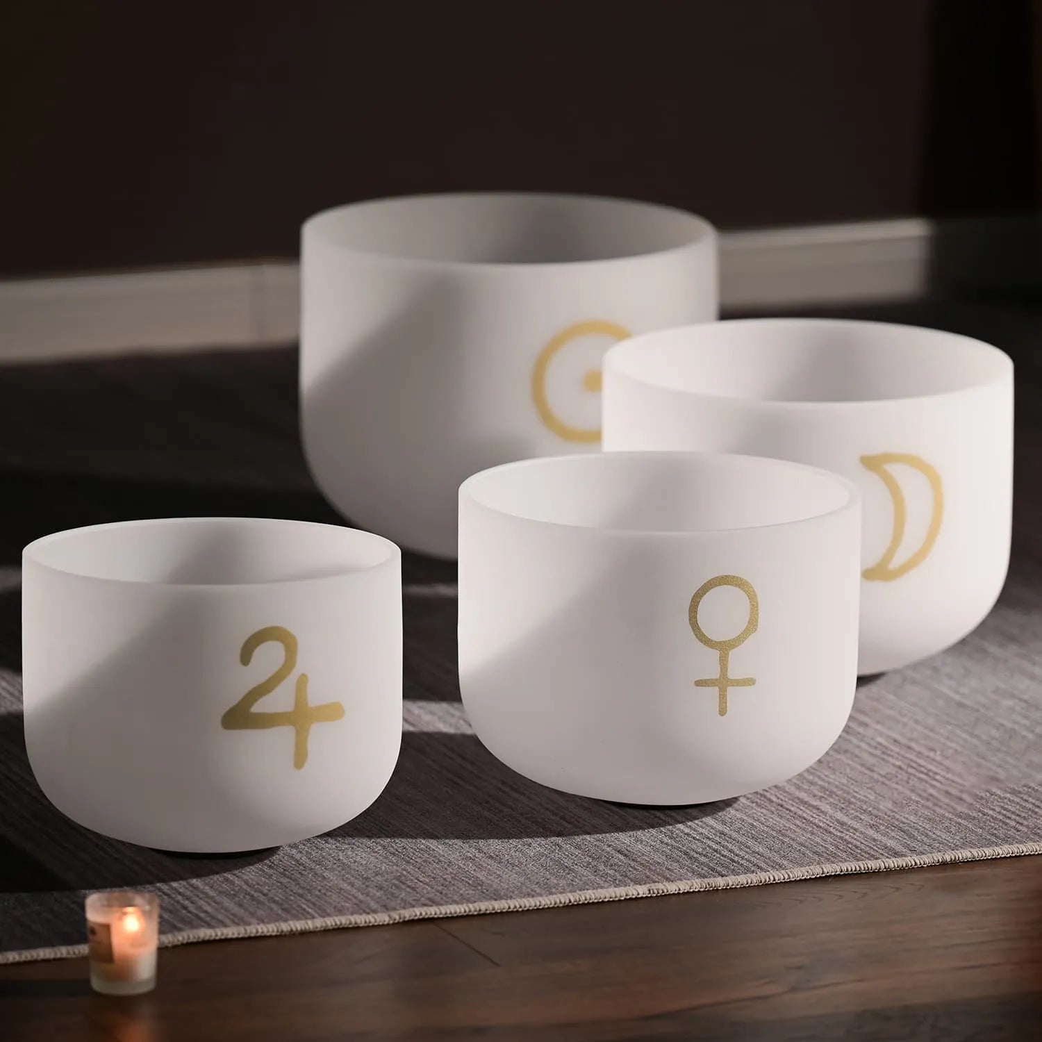 Pattern White Crystal Singing Bowl Set featuring gold astrological symbols on white bowls