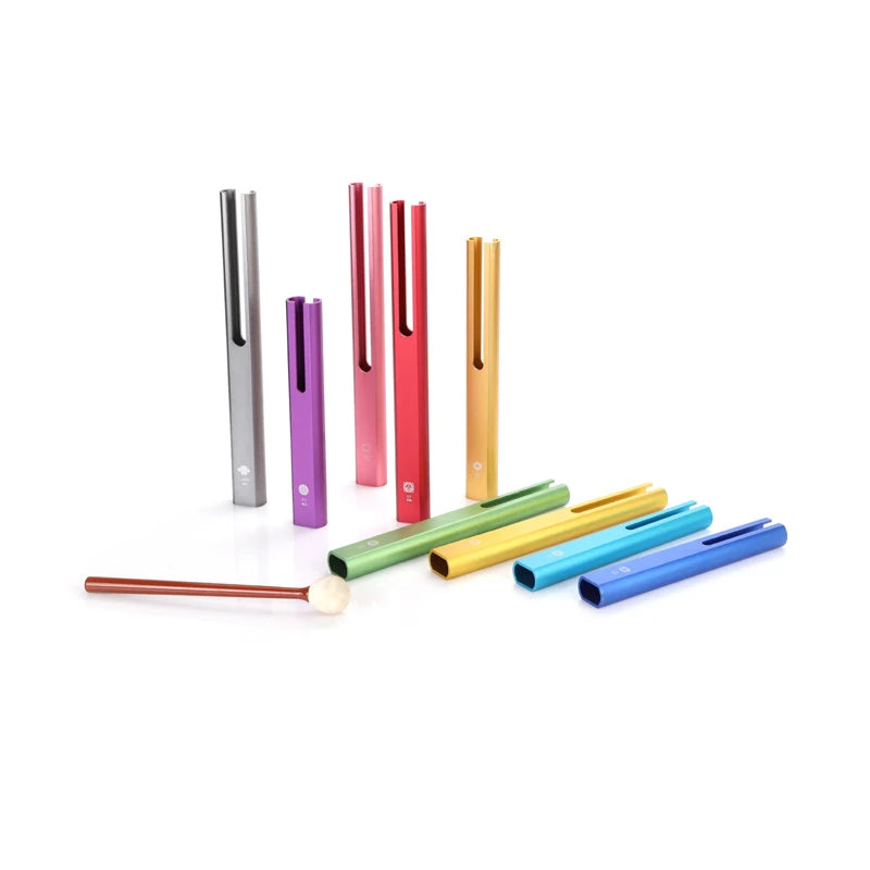 Colorful aluminum tubular bells with striker mallet for sound healing.