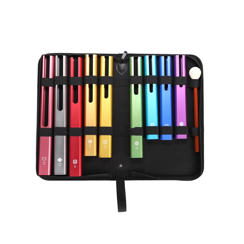 Tubular bells and mallet packed in black carrying case.