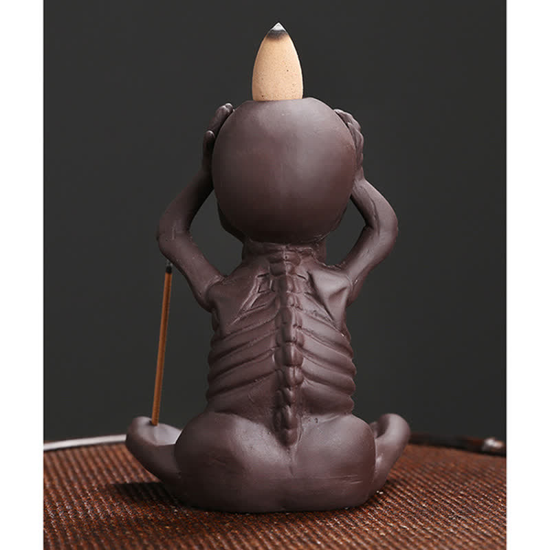 Brûleur d'encens à reflux en argile violette Petit Crâne pour la paix