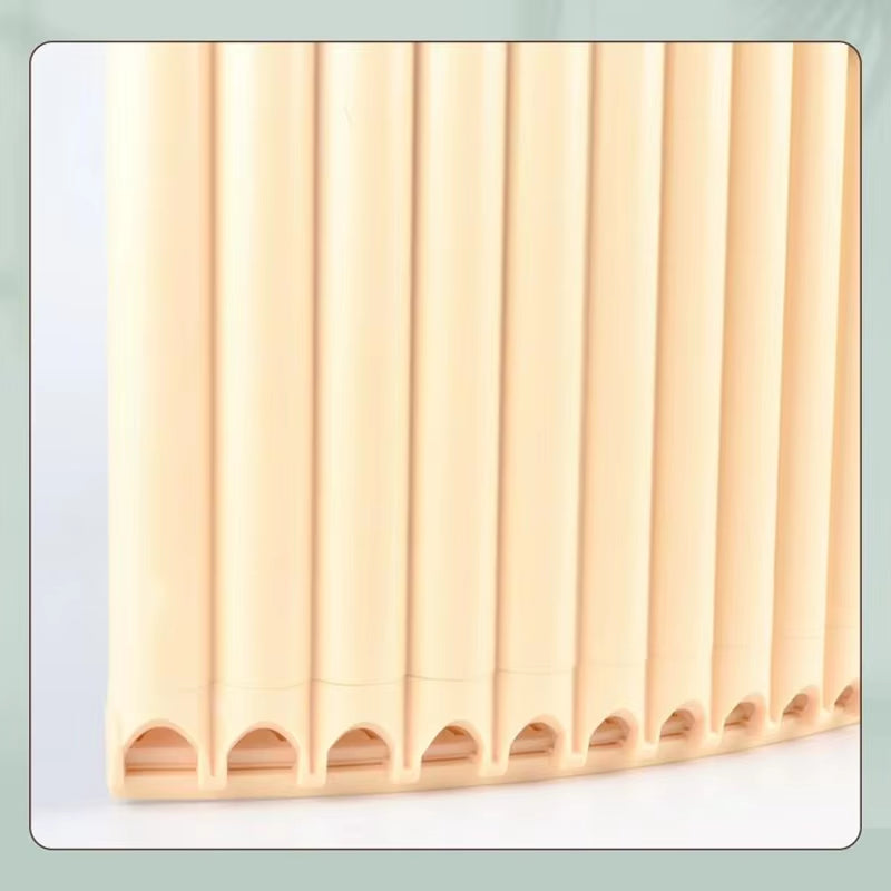 Vertical cream-colored plastic blinds with curved edges for ABS Pan Flute product display