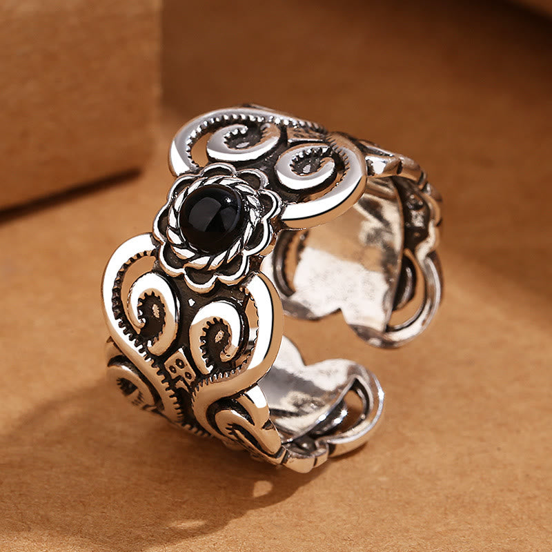 Bague porte-bonheur réglable en onyx noir avec bande en cuivre