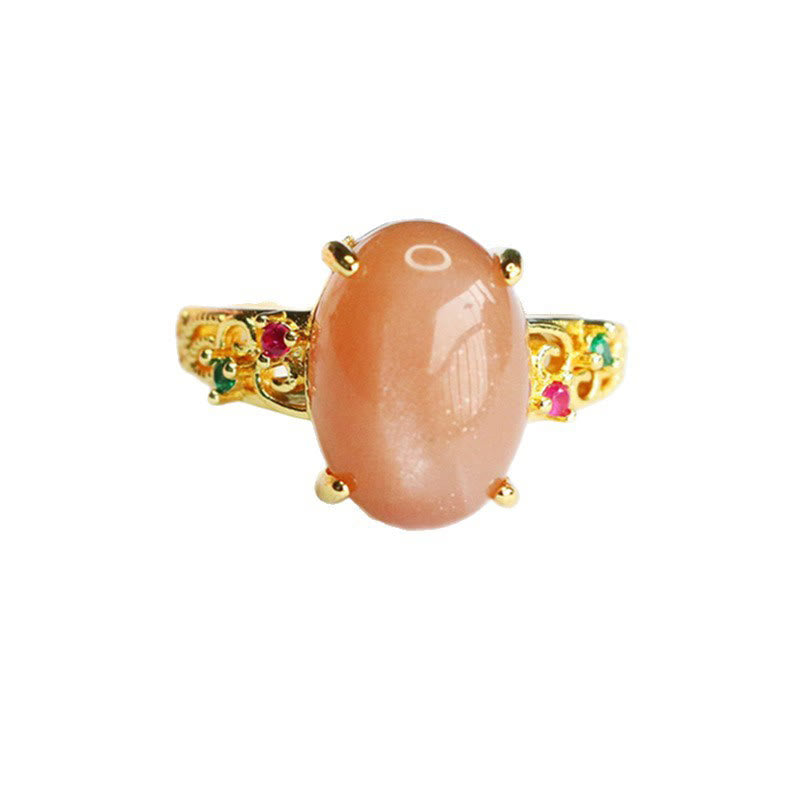 Bague ajustable en pierre de lune pêche - Joie et créativité