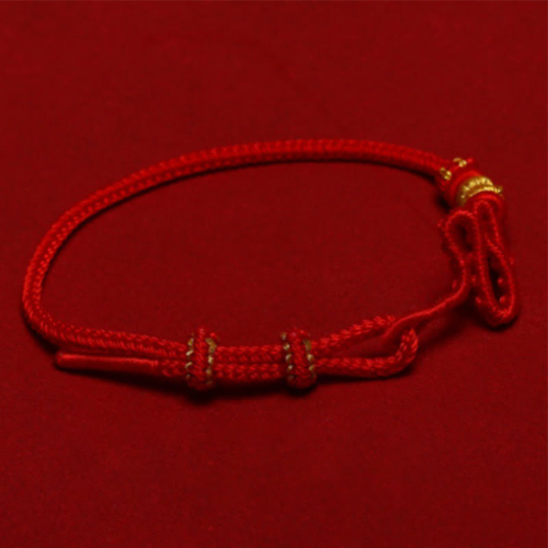 Bracelet de protection réglable en corde rouge avec nœud de serpent