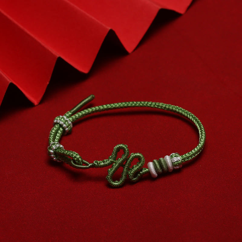 Bracelet de protection réglable en corde rouge avec nœud de serpent