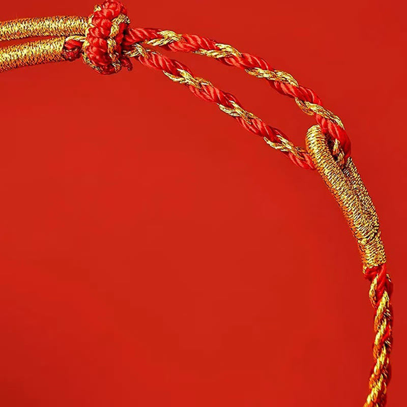Bracelet porte-bonheur réglable en fil rouge et fil jaune 14-22 cm